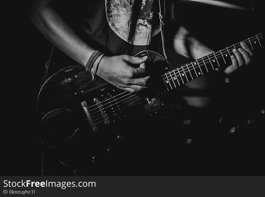 Man Playing Guitar