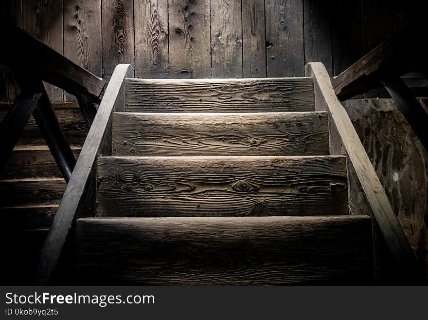 Very old wooden steps in the darkness