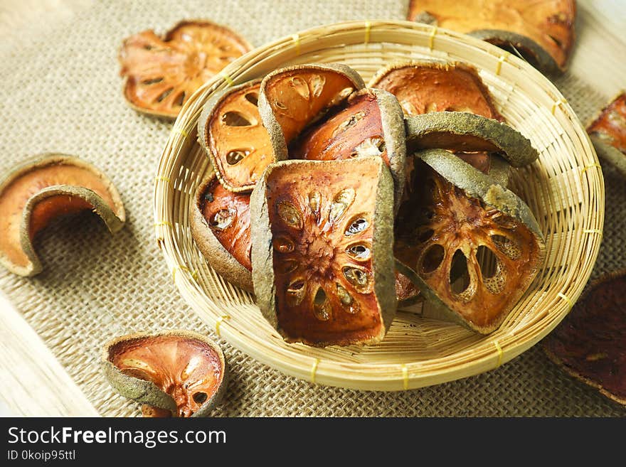 Slices Of Dry Bael Fruit In Basket