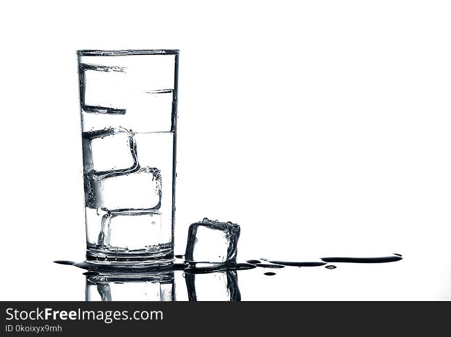 Ice Cubes In Fresh Drinking Water In Glass