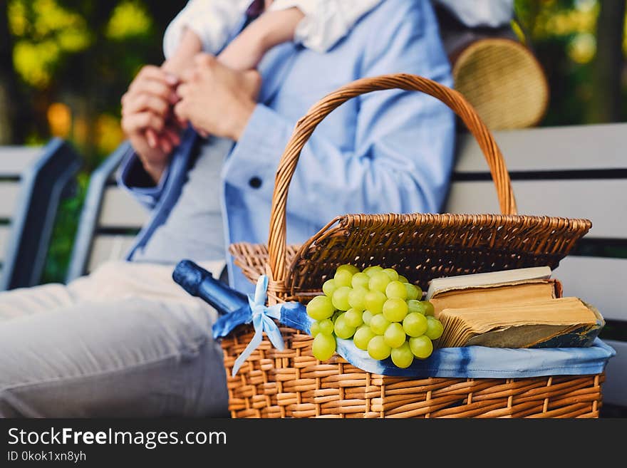 Close up image of picnic basket full of fruits, bread and wine. Close up image of picnic basket full of fruits, bread and wine.