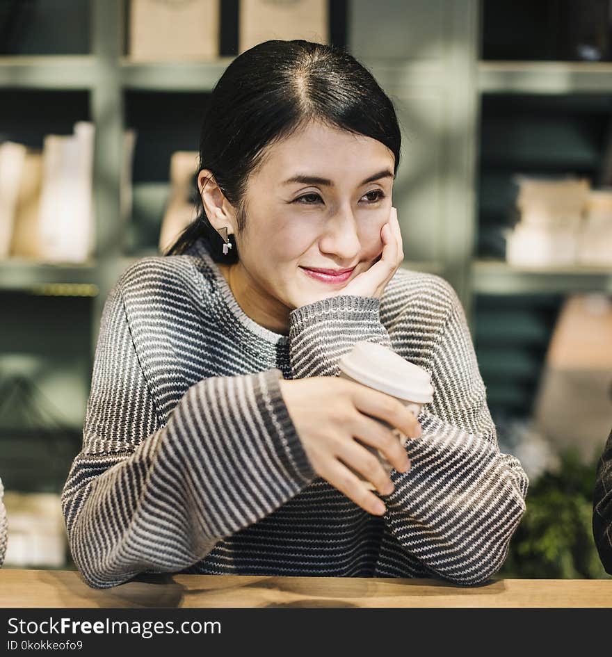 Photography of a Smiling Woman Wearing Sweater