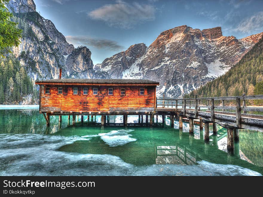 Brown Wooden House Near Mountain