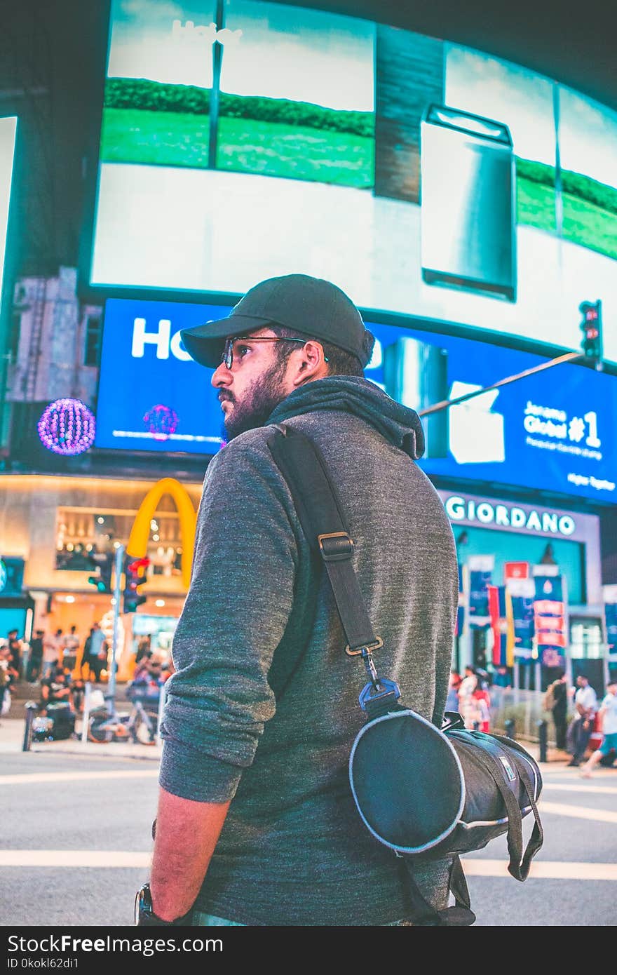 Man Wearing Black Cap