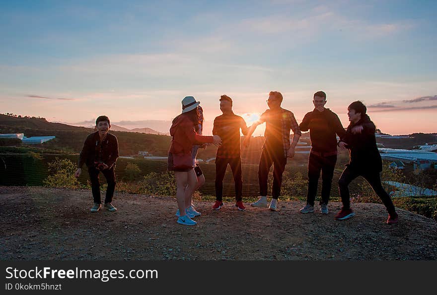 People Gathering during Sunset