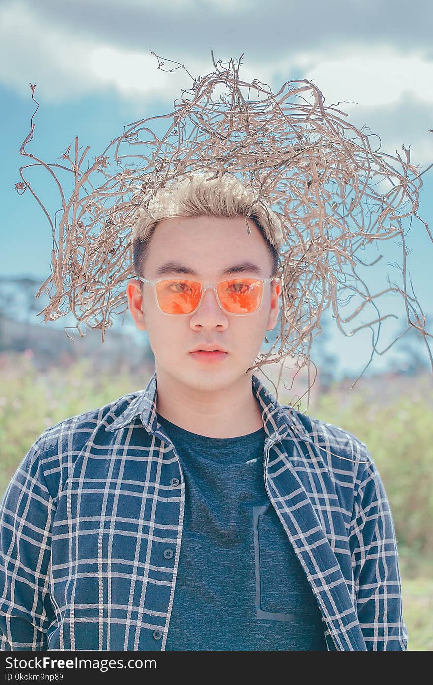 Portrait Photo Of Man Wearing Sunglasses And Button-up Shirt