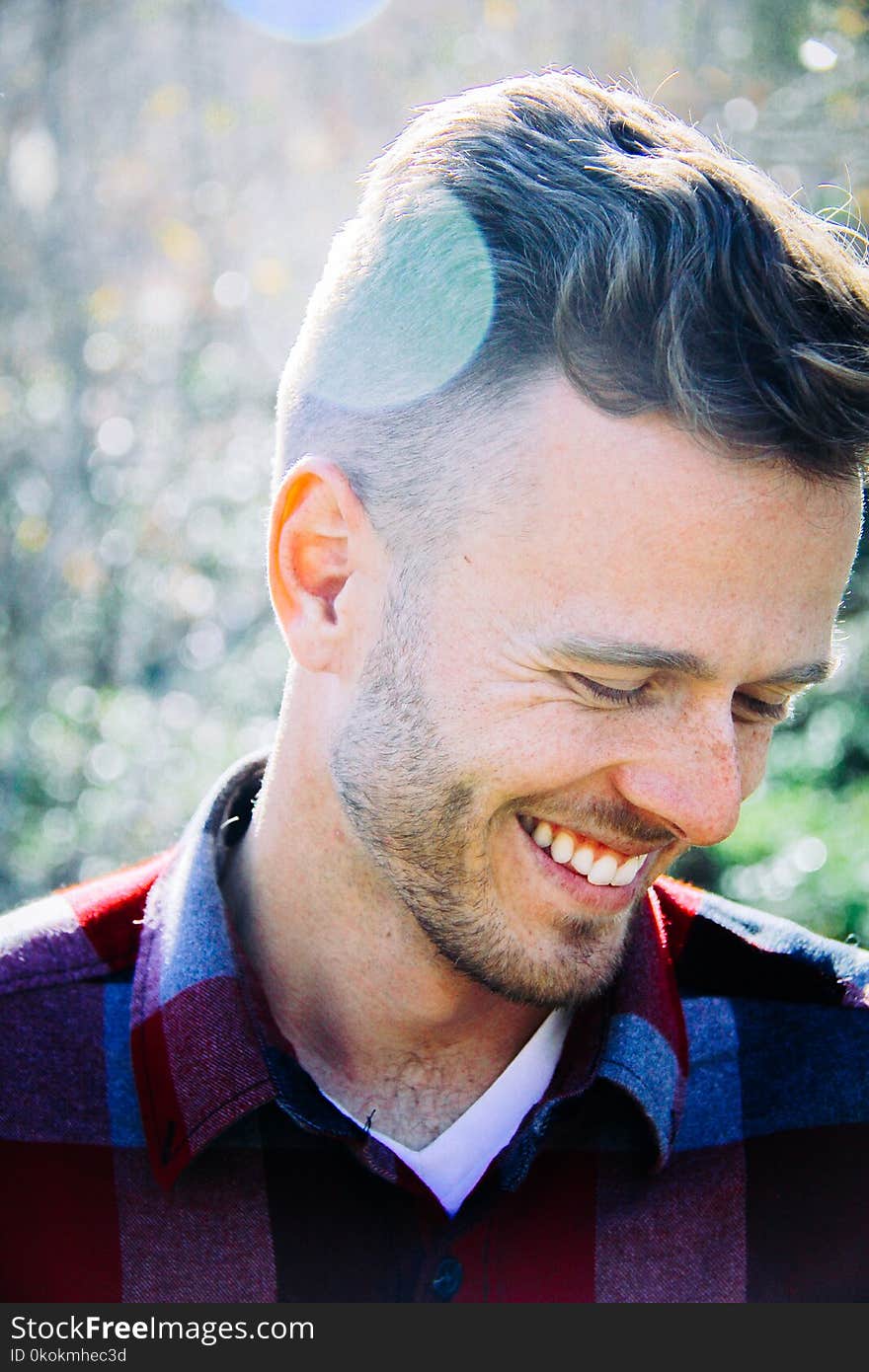 Close-Up Photography of a Smiling Man