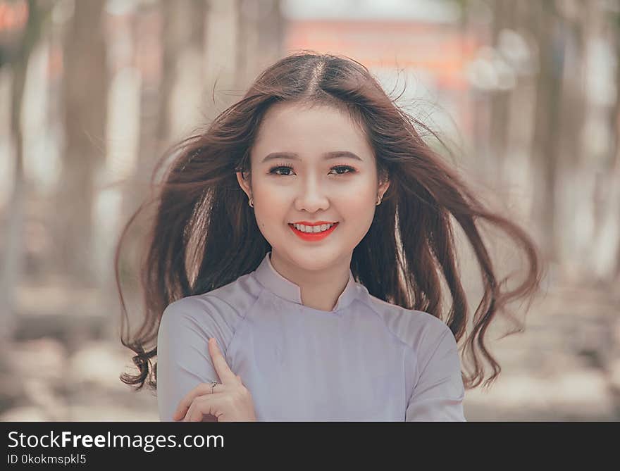 Close-Up Photography of a Smiling Woman