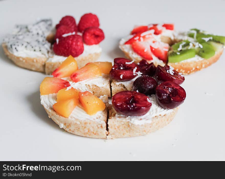 Three Biscuits With Fruit Toppings