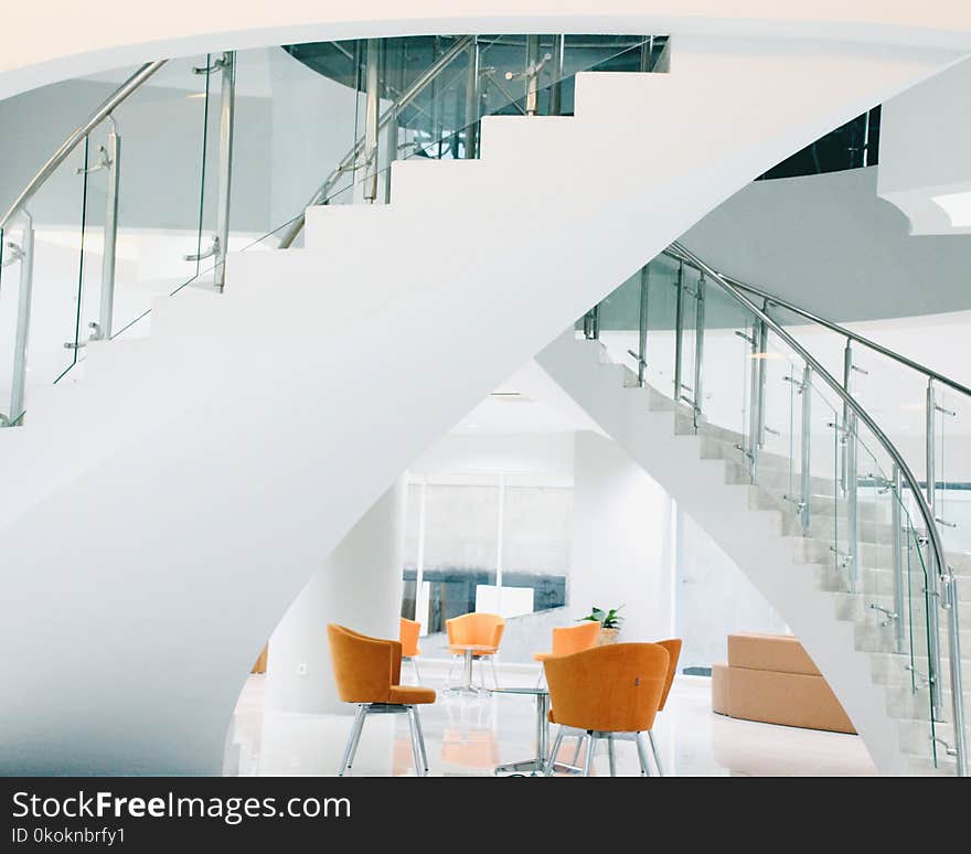 Orange Chairs Near Staircase