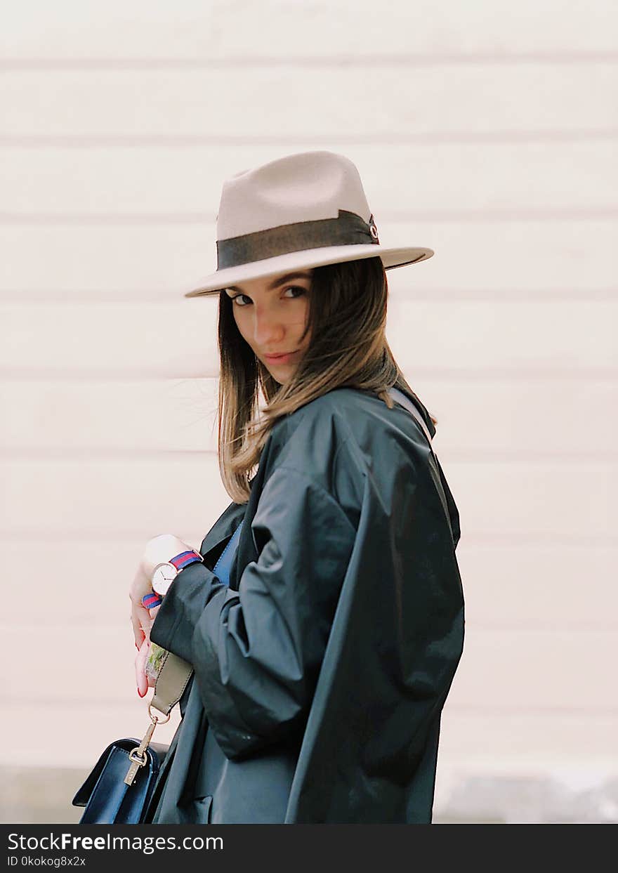 Photography of a Woman Wearing Fedora