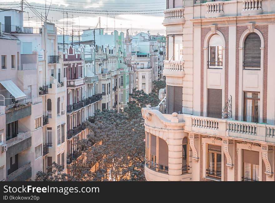 Beige and White Concrete Buildings Photography