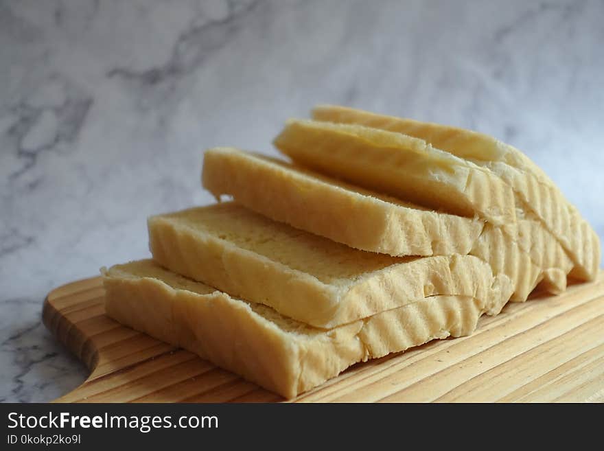 Sliced Loaf Bread on Chopping Boar