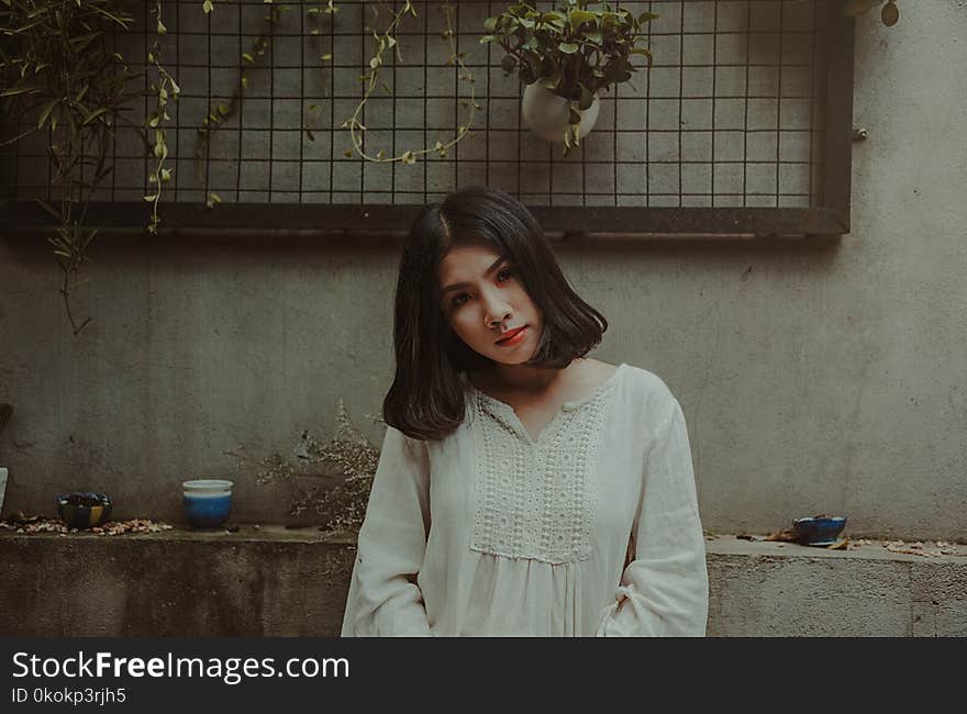 Photography of a Woman Wearing White Top