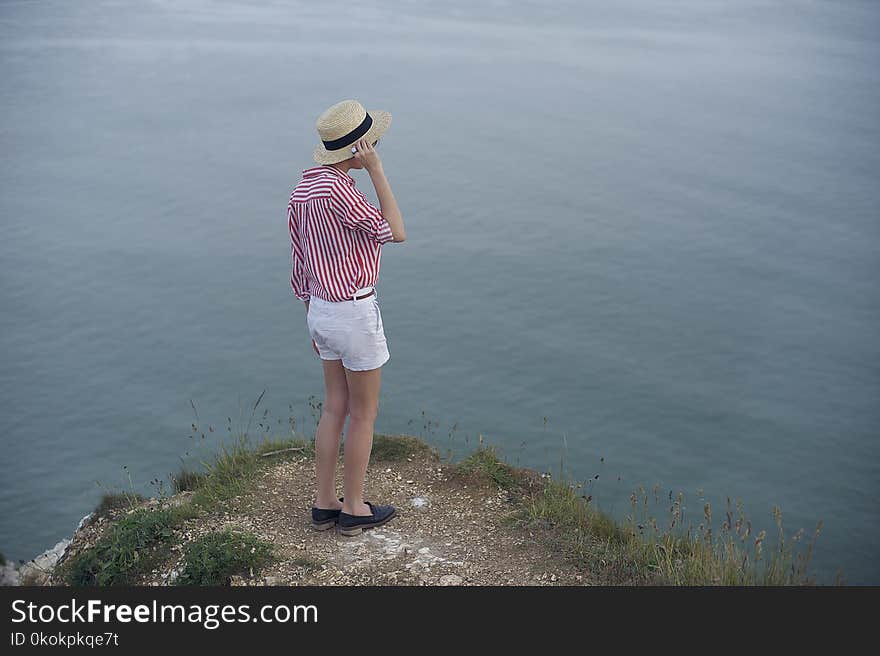 Girl In Red And White Striped Dress Shirt