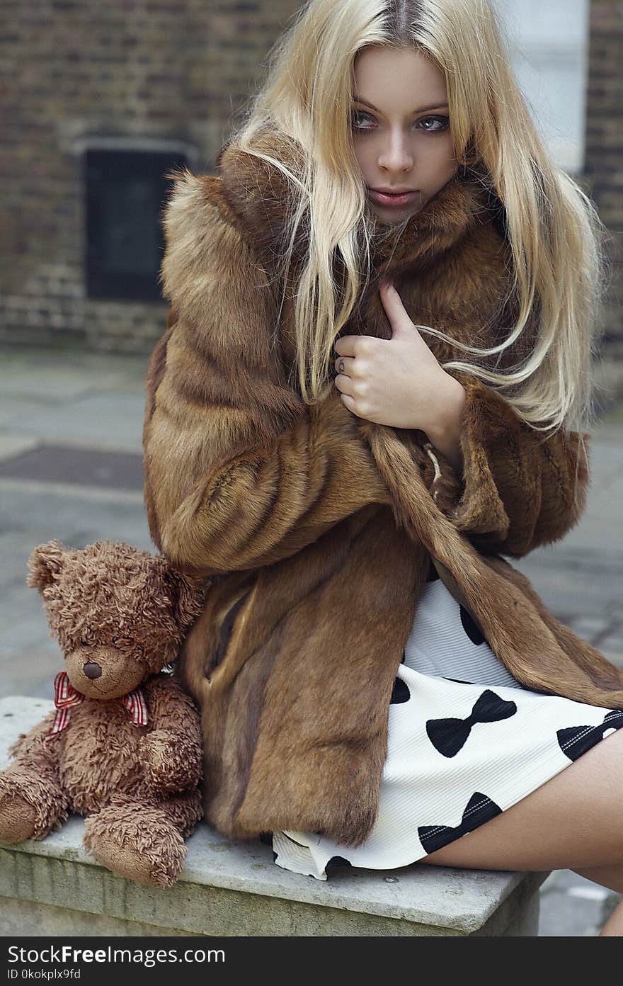 Photography of a Woman Wearing Fur Coat