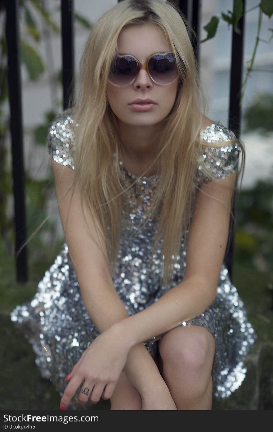 Photography of a Woman Wearing Silver Dress