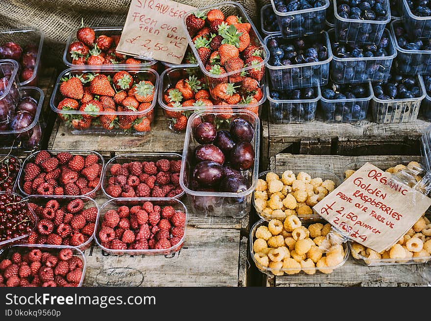 Photo of Assorted Fruits on Clear Plastic Packs