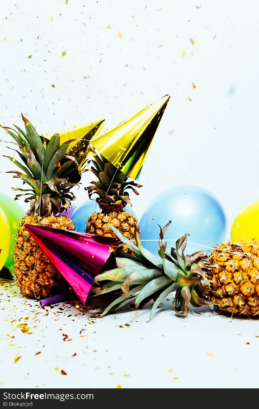 Three Pineapples With Gold Party Hats