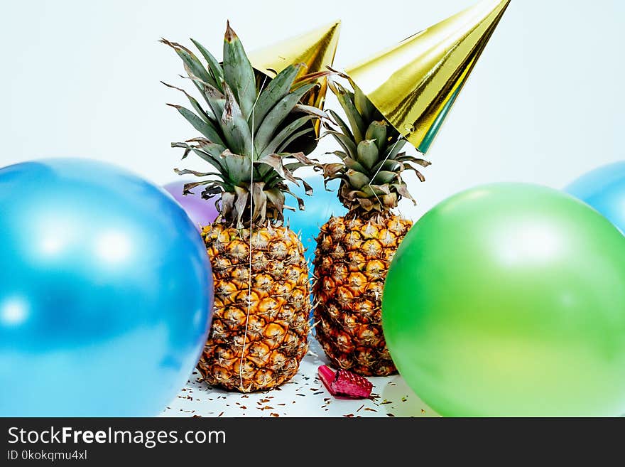 Two Pineapples And Balloons