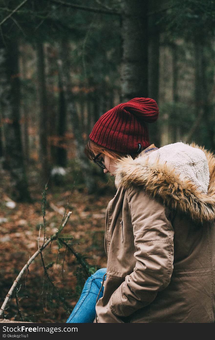 Woman Wearing Red Knit Beanie