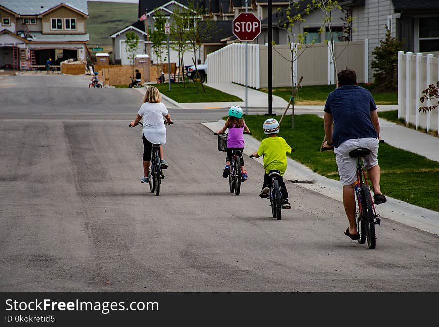 Family Riding on Bicycle