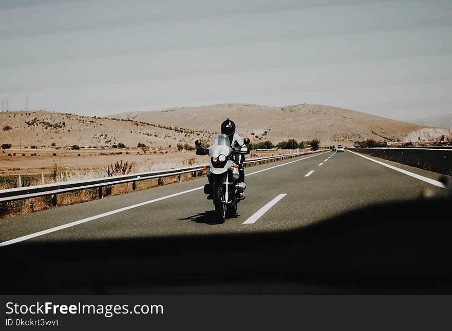 Person Riding Motorcycle