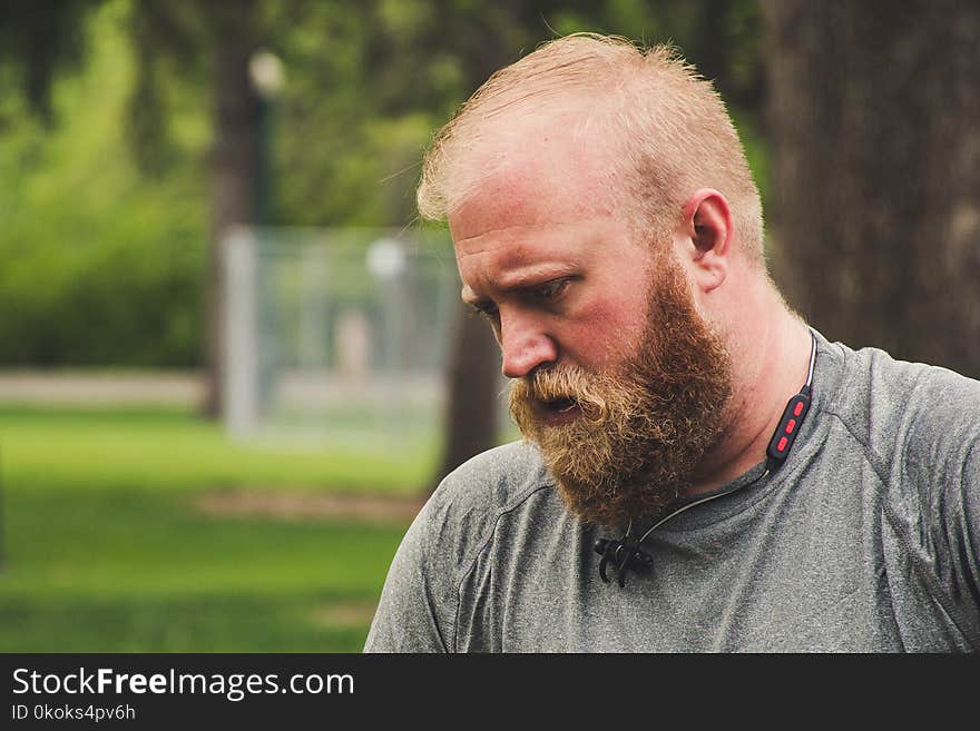 Man Wearing Grey Top