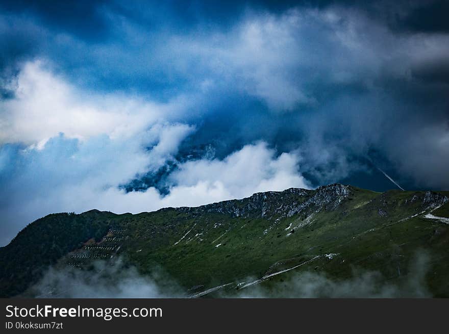 Green Mountain Under Clouds