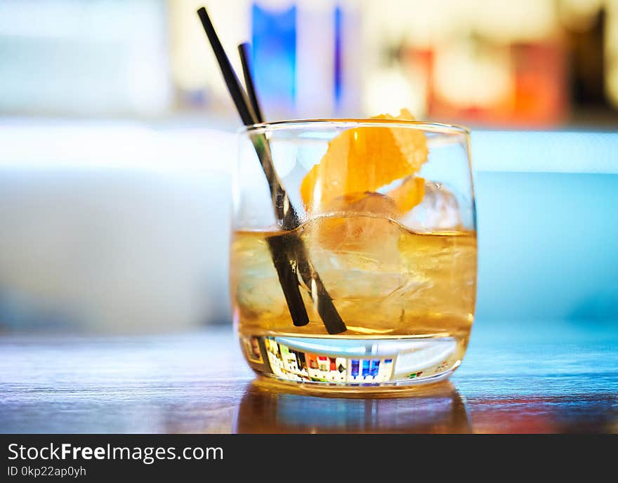 Glass with cocktail on the bar counter