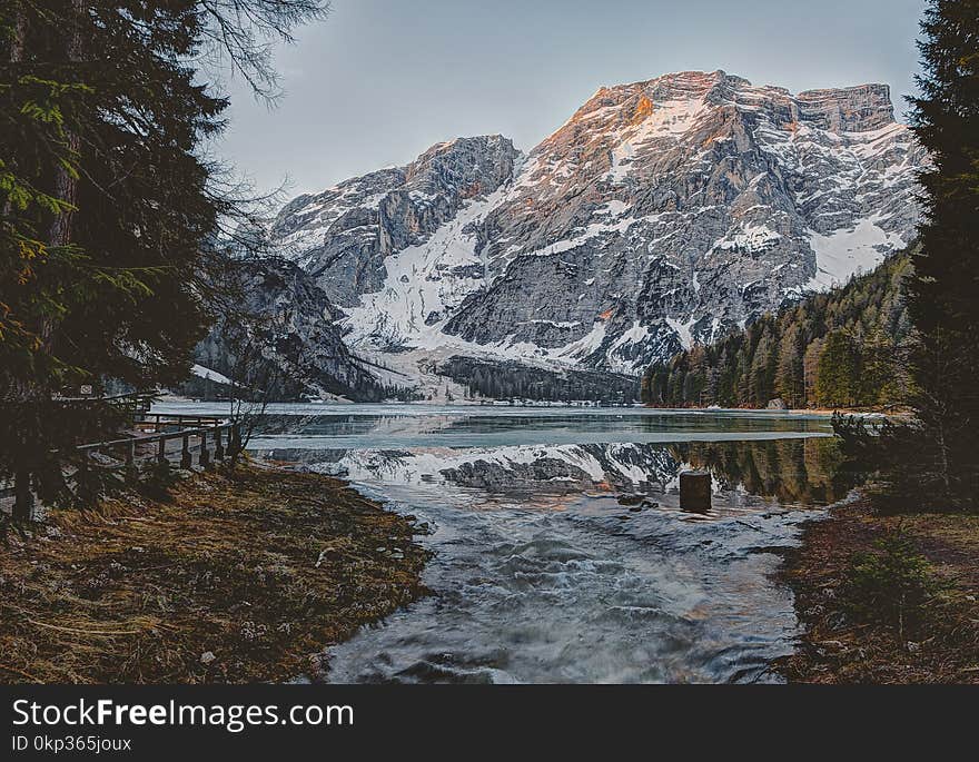 Landscape Photography of Body Water Across Mountain