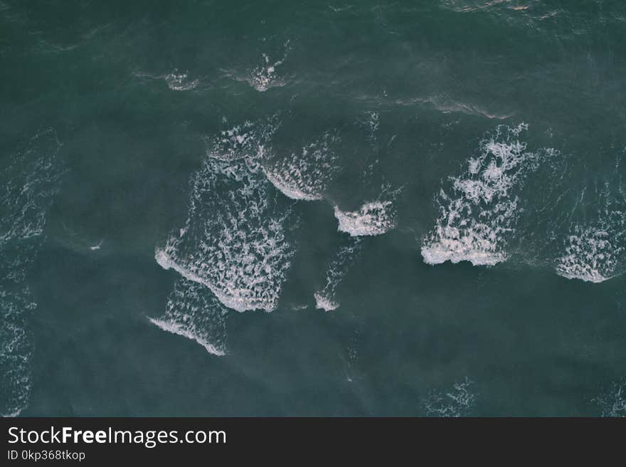 Aerial Photography of Ocean Waves at Daytime