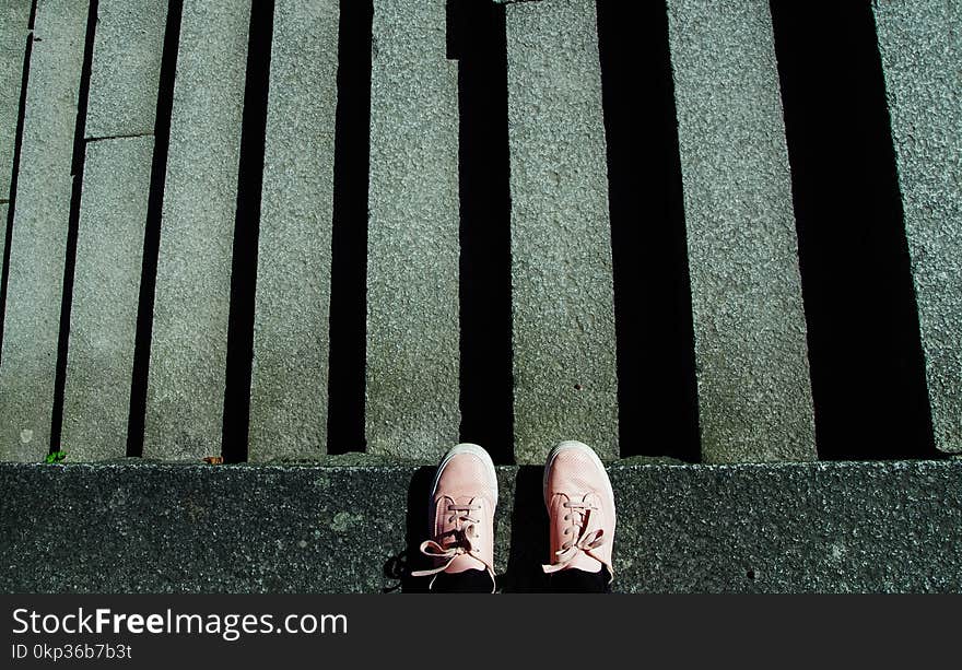 Photography of Shoes Near Stairs