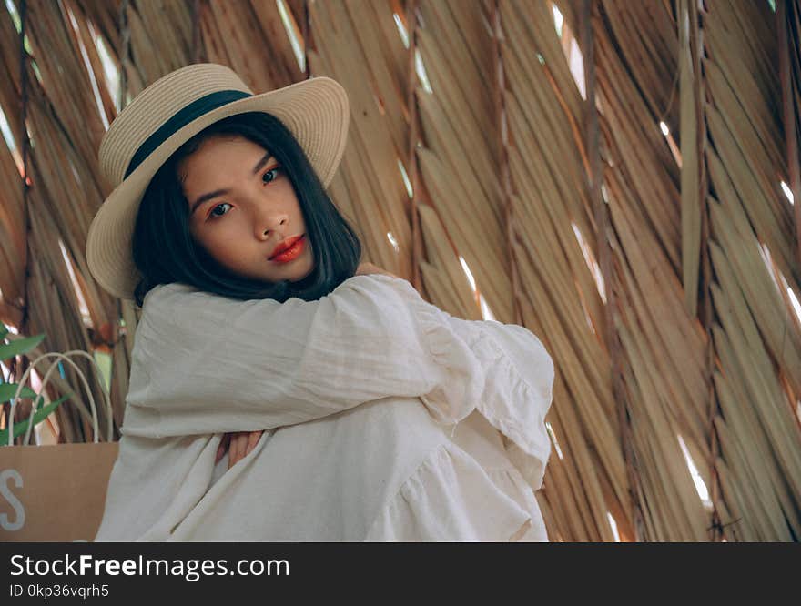 Woman Wearing Brown Hat