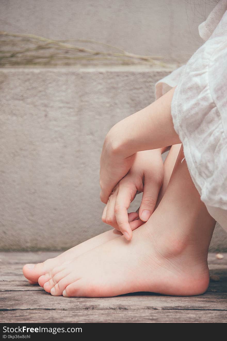 Close-Up Photography of Hands And Feet