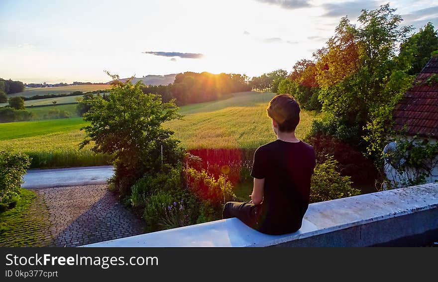 Man Wearing Black Crew-neck Shirt