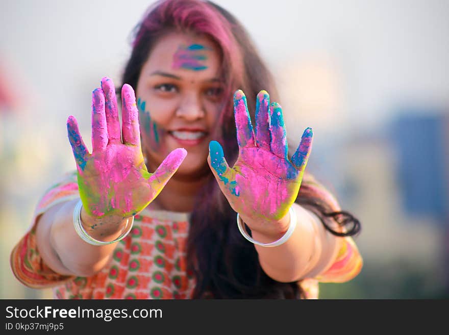 Woman Showing Her Hands With Assorted Color Paints