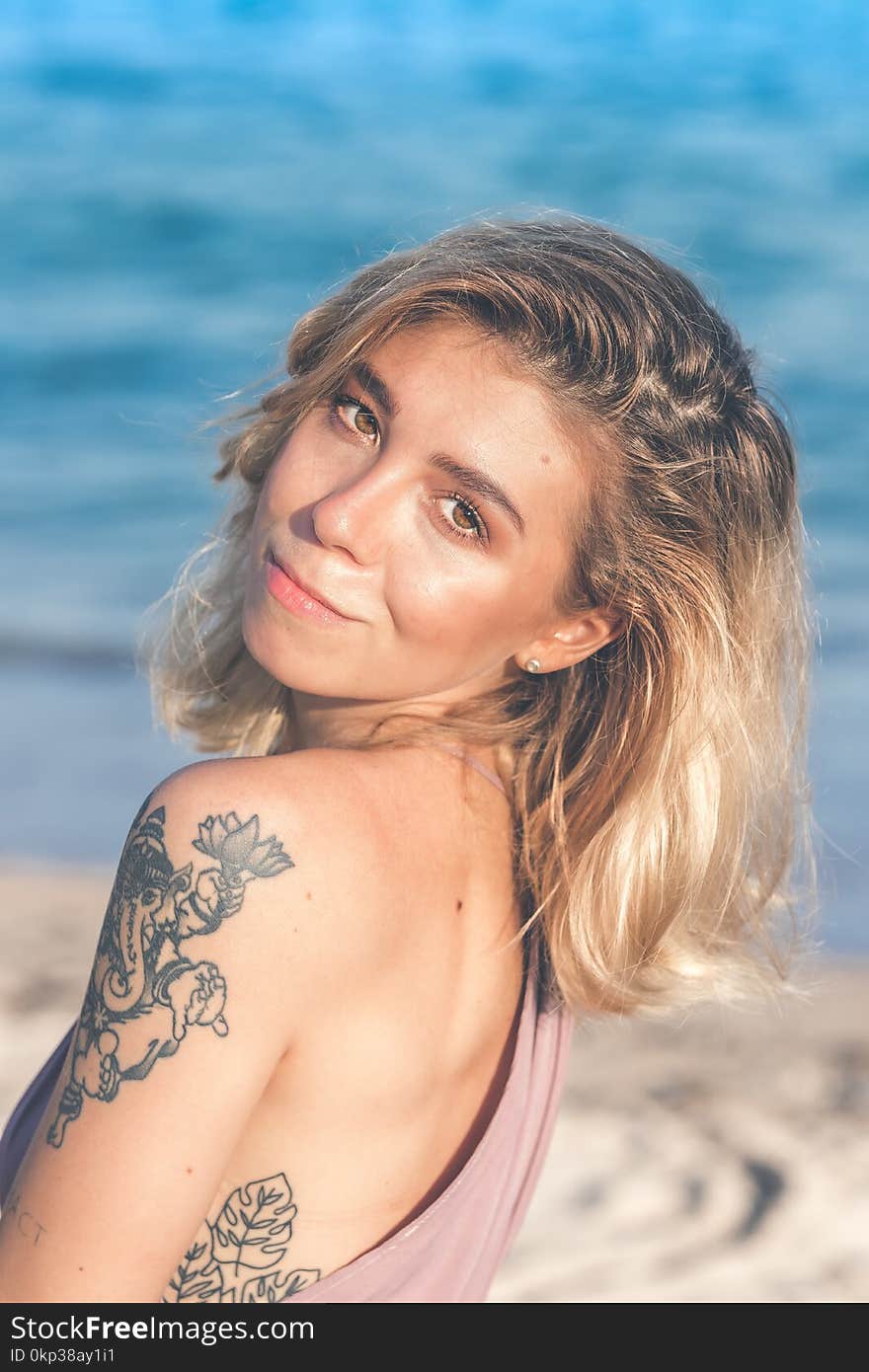 Close-Up Photography of a Woman With Tattoo