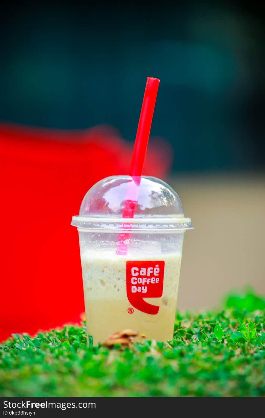 Close-Up Photography of Plastic Cup with Dome Lid