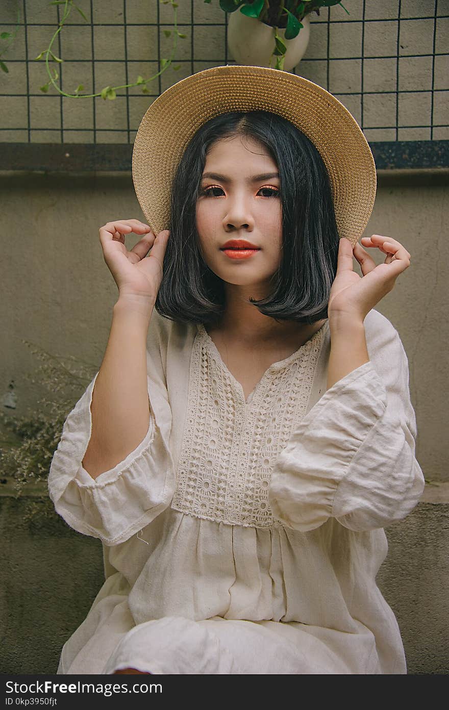 Woman Wearing White Long-sleeved Dress