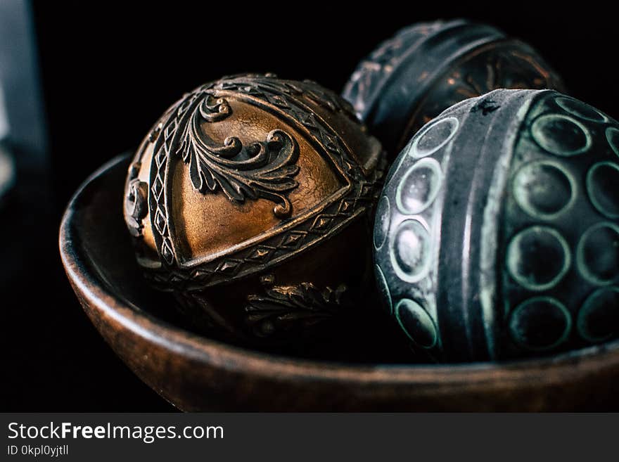 Black and Brown Ball Decor in Bowl