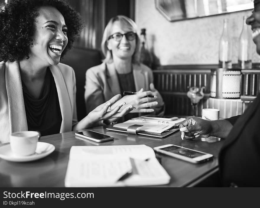 Grayscale Photo Of Smiling Women