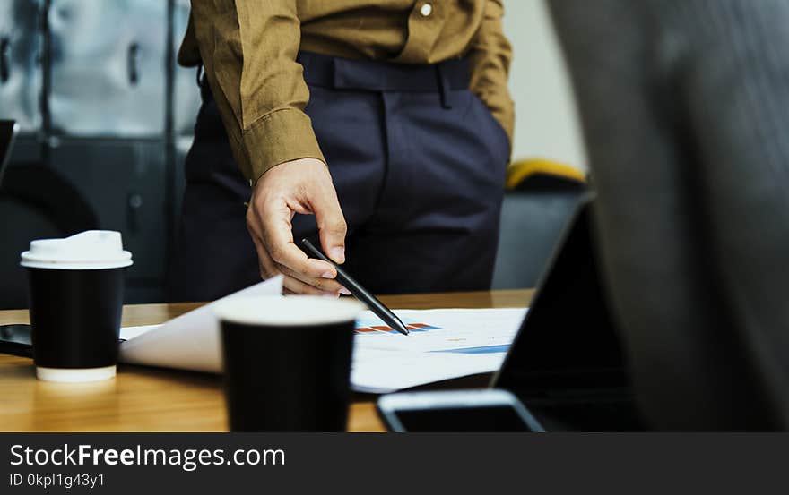 Man Wearing Black Dress Pants and Brown Dress Shirt