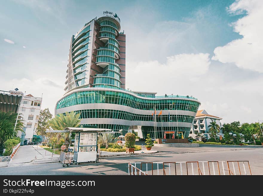 High Rise Building With Green Glass Windows