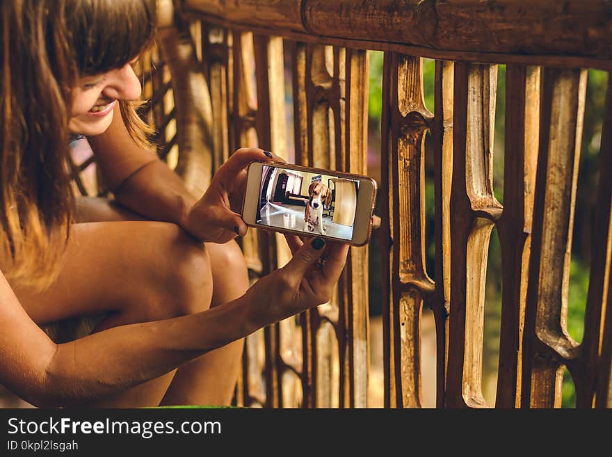 Woman Holding Smartphone