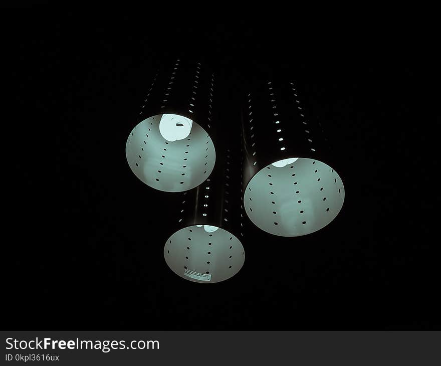 Photography of Three Lamps on Dark Room