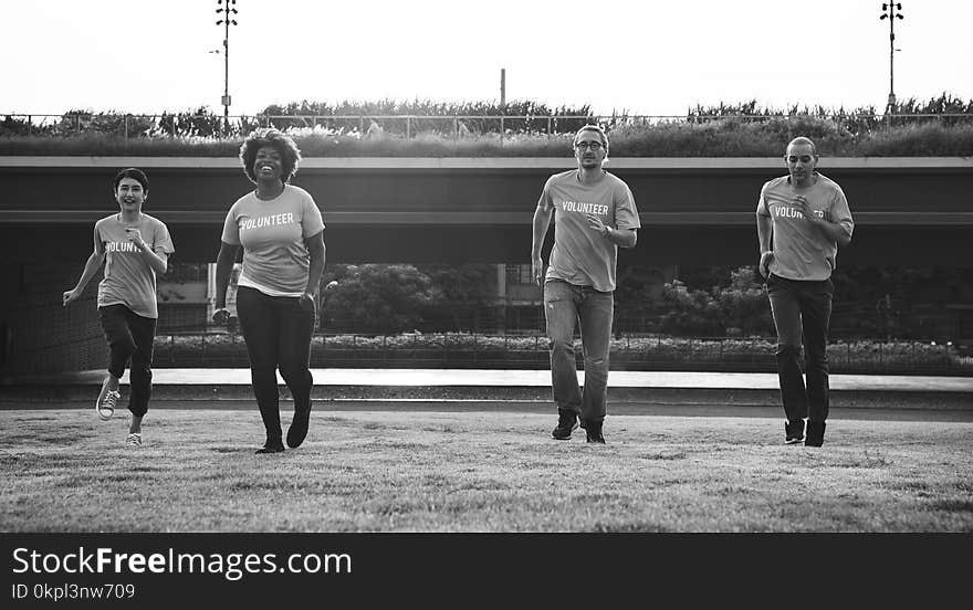 Four People Running