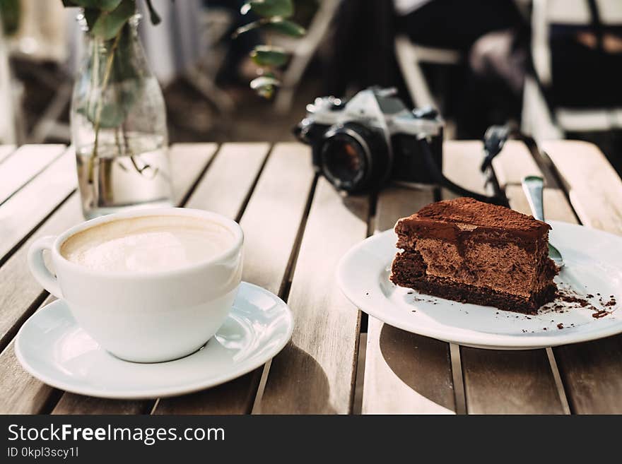 Chocolate Cake Near Milk on Cup