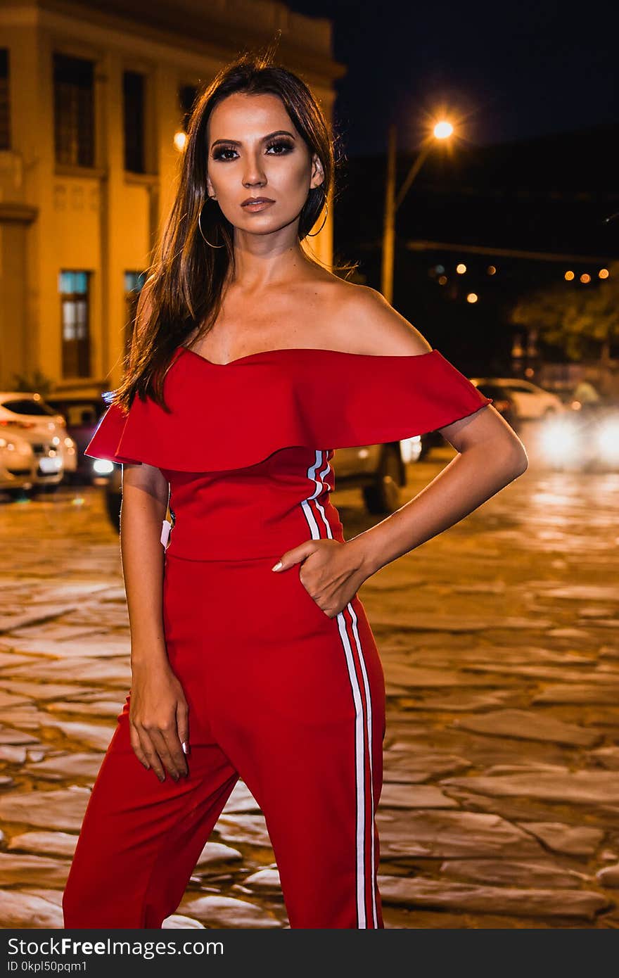 Woman Wearing Red Jumpsuit