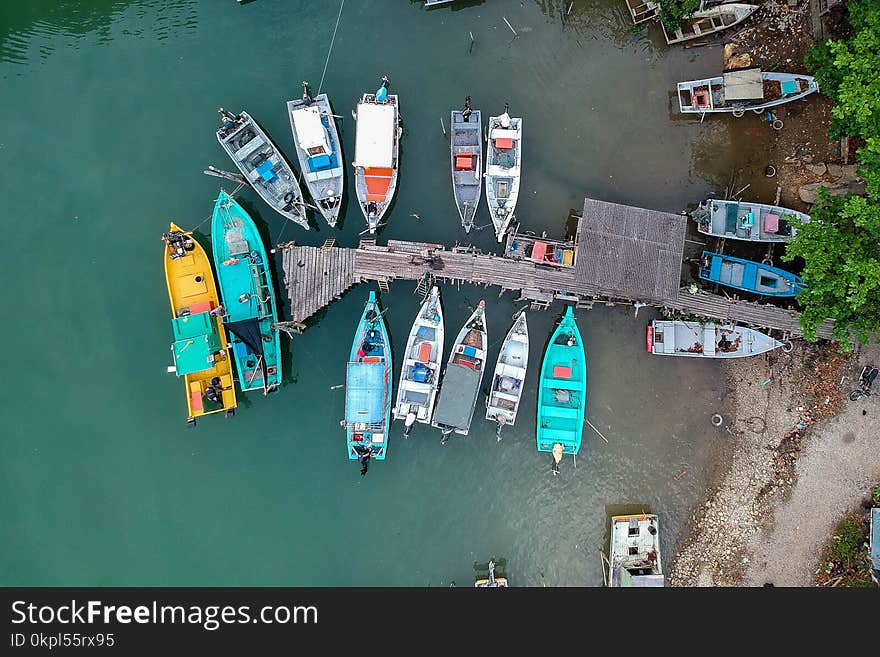 Aerial Shot Of Boats On Body Of Water